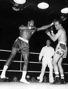 Action during the non-title heavyweight fight between American Cassius Clay