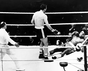 00131 Prints: Action during the non-title heavyweight fight between American Cassius Clay