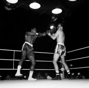 00398 Prints: Action during the non-title heavyweight fight between American Cassius Clay