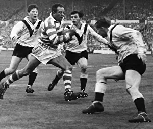 1959 Prints: Action during the Rugby League clash between Wigan and Hull during the Challenge Cup