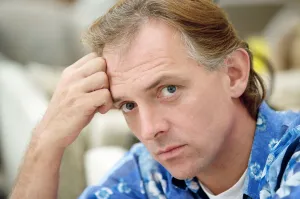 Actor and comedian, Rik Mayall, pictured at home four months after his horrific quad bike