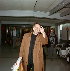 Actor and comedian, Rik Mayall, pictured at London Airport. 29th March 1992