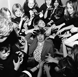 Actor Jack Wild (centre with spotted shirt on) who played the role of the Artful Dodger