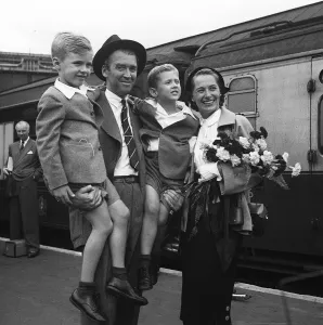 Actor James Stewart arrives in England with his wife and family 1950
