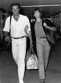 Actions Prints: Actor John James and new wife Denise Coward in June 1989 at London Heathrow