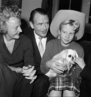 Actor John Mills at home with his wife Mary Hayley Bell and their daughter Hayley
