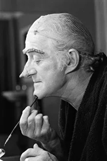 Actor John Pertwee in the dressing room being made up for his role as Wurzel Gummidge in