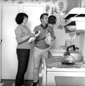 Kitchen Prints: Actor Johnny Briggs at home with his wife Caroline. Circa 1963
