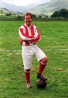 Actor Jonathan Watson August 1998 in old fashioned football kit during filming of
