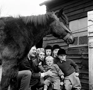 Actor Leslie Phillips with his wife Penelope Bartley and their four children, Caroline
