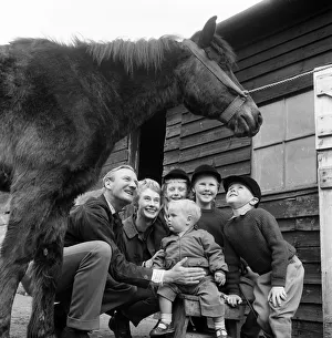Actor Leslie Phillips with his wife Penelope Bartley and their four children, Caroline