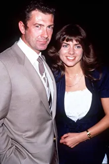 Screen Prints: Actor Lewis Collins in September 1988 with his wife at a wedding party at Langans
