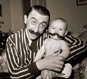 Striped Prints: Actor Mario Fabrizi 1961 with his 5 month old baby son Anthony Fabrizi Big