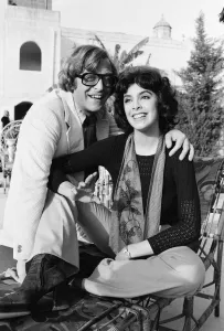 Trousers Prints: Actor Michael Caine with Nadia Cassini on the set of their new film Pulp during filming