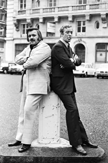 Actor Michael Caine poses with Tony Mascia in Hanover Square during a break in filming