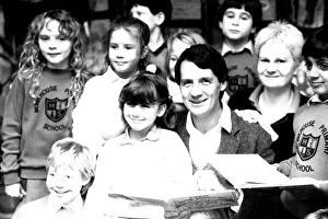 Actor Michael Palin pays a surprise visit to Monkhouse Primary School in North Shields to