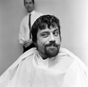 Images Dated 20th July 2021: Actor, Oliver Reed, had to make a decision whether to keep his beard or to keep