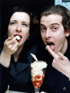 Actor Peter Capaldi eating cream with his actress wife Elaine