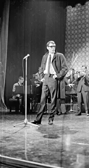 Ties Prints: Actor Peter O Toole on stage at Stars Shine for Jack Hylton with an orchestra