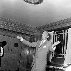 Playwright Prints: Actor and playwright Noel Coward performing at the Dorchester Hotel London