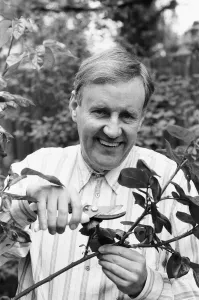 Actor Richard Briers seen here in the garden pruning roses at his West London home