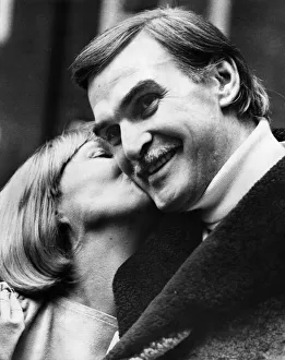 Moustaches Prints: Actor Stanley Baker. Stanley Baker with his wife Ellen in London today