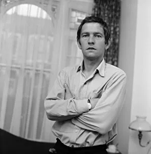 01406 Collection: Actor Tom Courtenay, pictured at his home in Fulham. 5th July 1967