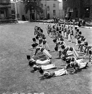 Falling Prints: Actors, toy soldiers on parade: Toy soldiers fainting whilst rehearsing at St Josephs