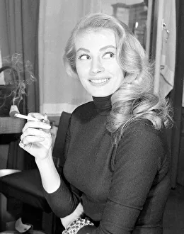 Actress Anita Ekberg seen here during a Daily Mirror photo shoot in her hotel room were
