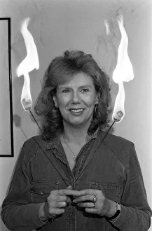 Actress Anna Karen practising her fire-eating act at her home in Ilford, Essex