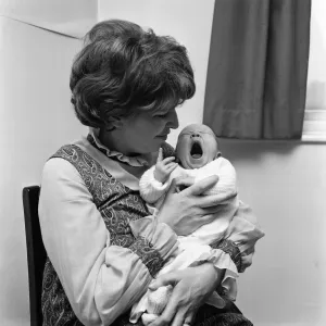 01121 Prints: Actress Anne Reid at home in Manchester with her newborn baby son. 23rd November 1971