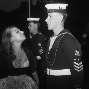 Cadets Prints: Actress April Orlich with Naval Cadets at the Premiere of the film of the Titanic