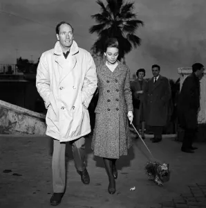 01130 Prints: Actress Audrey Hepburn and her husband Mel Ferrer photographed in Rome. 8th January 1960