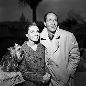 01130 Prints: Actress Audrey Hepburn and her husband Mel Ferrer photographed in Rome. 8th January 1960