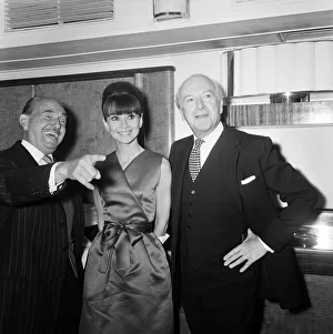 01130 Prints: Actress Audrey Hepburn pictured with Jack L Warner (left
