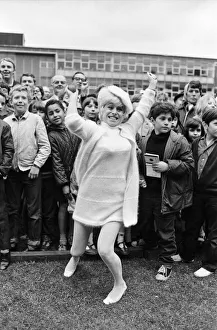 01112 Prints: Actress Barbara Windsor was lucky on the coconut shy at The William Ellis School summer