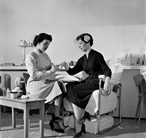 Actress Colette Wilde loves having her nails manicure. April 1953 D1780