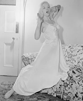 Long Prints: Actress Diana Dors actress wearing a silk style nightdress in the film