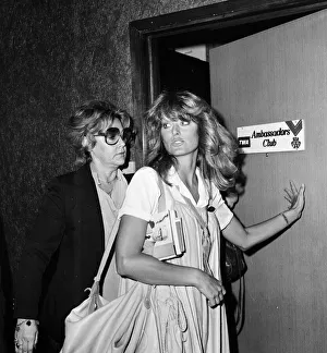 Opening Prints: US actress Farrah Fawcett Majors enters TWA Ambassador Club at London Heathrow Airport