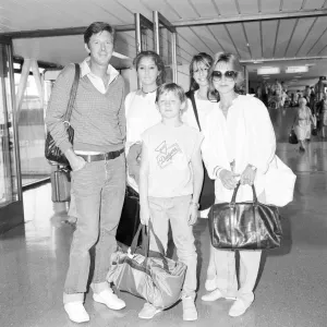 Square Prints: Actress Felicity Kendal with her family at Heathrow July 1984 her husband