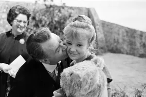 Actress Hayley Mills celebrates her 17th birthday with her father, actor John Mills