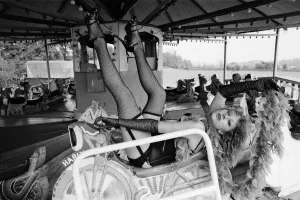 Actress Helen Mirren wearing a fishnet tights portraying character of fairground stripper