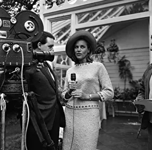 Microphones Prints: Actress Honor Blackman in her garden party outfit during the filming of