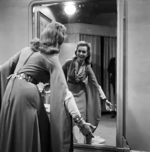Square Prints: Actress Janet Leigh looks at her reflection in the mirror at a costume fitting for