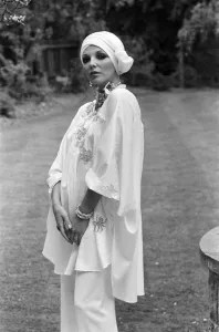 01081 Prints: Actress Joan Collins modelling outfits that she will wear on a trip to Tokyo to judge a