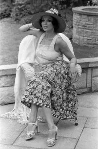 01081 Prints: Actress Joan Collins modelling outfits that she will wear on a trip to Tokyo to judge a