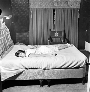 Tired Prints: Actress Joan Collins sleeping. December 1953 D7585-002
