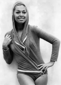 Actress Joan Crane was modelling a four-piece zip up swimsuit an stretch fabric by