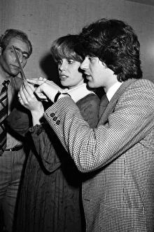 Hairdresser Prints: Actress Joanna Lumley judging a Purdey haircut lookalike contest with hairdresser John