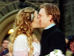 Actress Kate Winslet and Jim Threapleton November 1998 kissing after their surprise